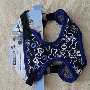 Harness with snap fasteners